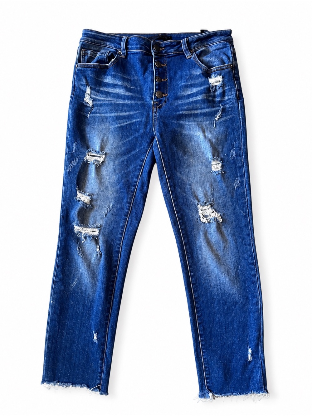 Risen distressed crop jeans. Button flyx